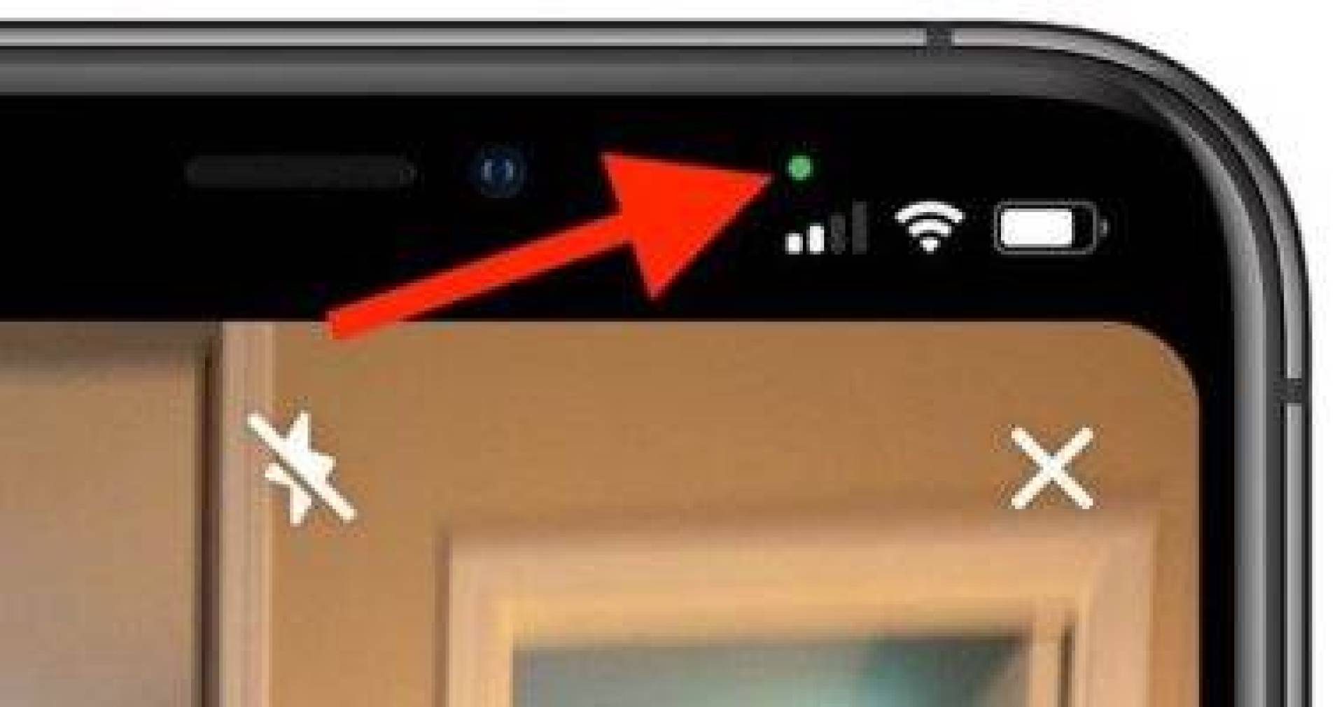 ما النقاط الخضراء والبرتقالية الموجودة بشاشة iPhone؟