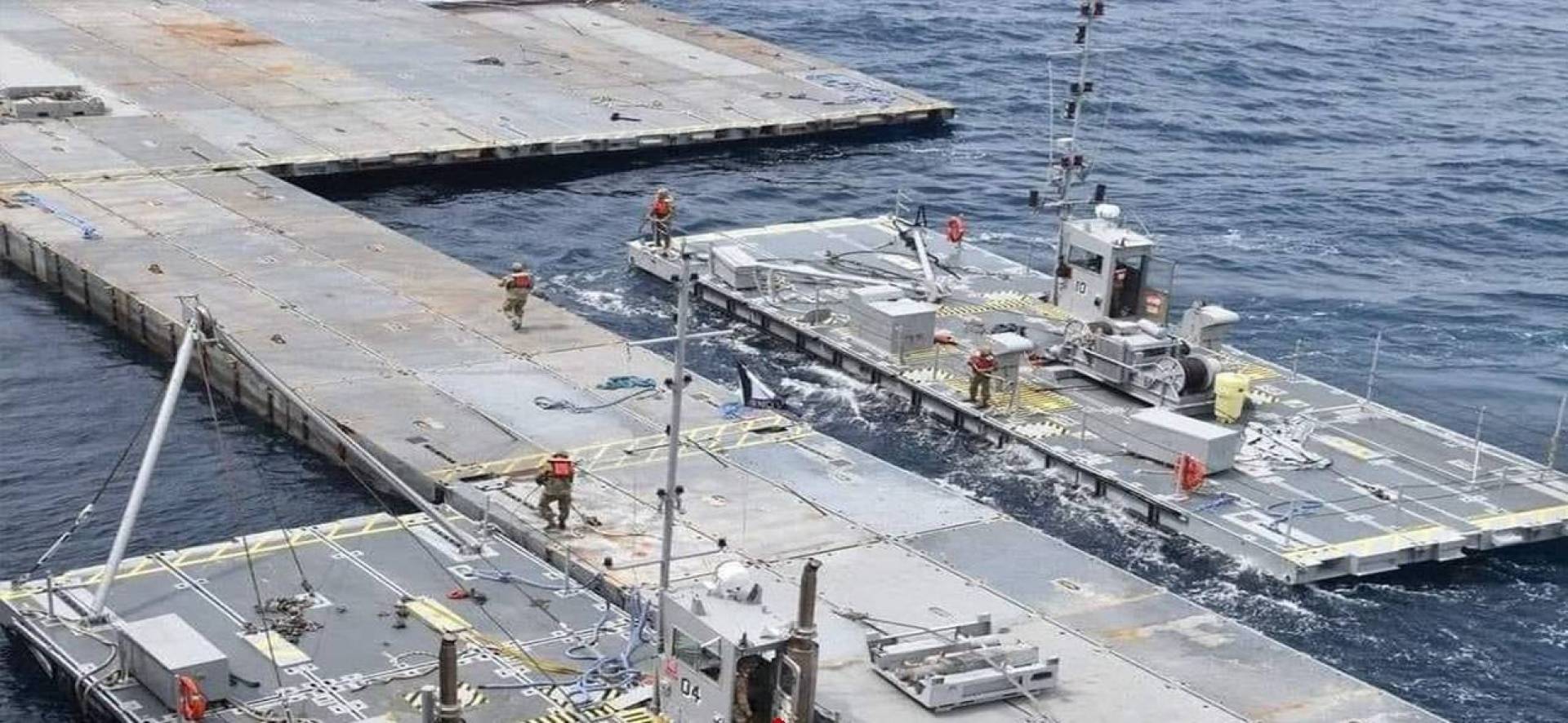 الأمم المتحدة تنقل أطنان من المساعدات التي تراكمت في منطقة الرصيف البحري