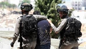 أسرى فلسطينيين أثناء مظاهرة مؤيدة لقطاع غزة